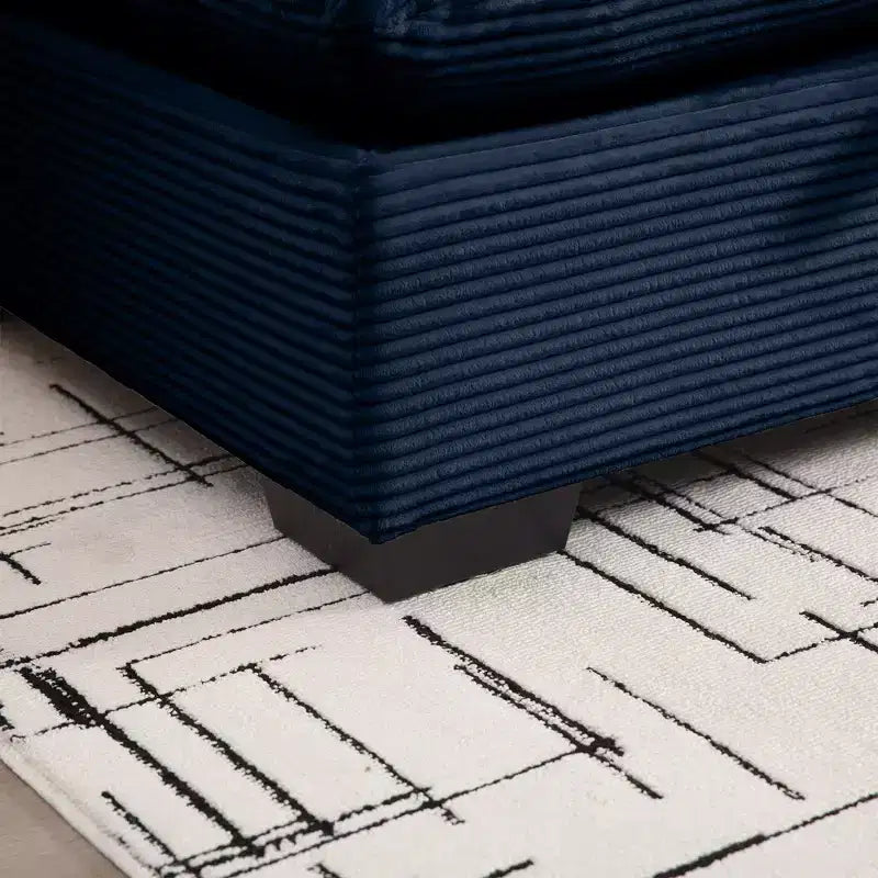 Fauteuil profond en velours côtelé
